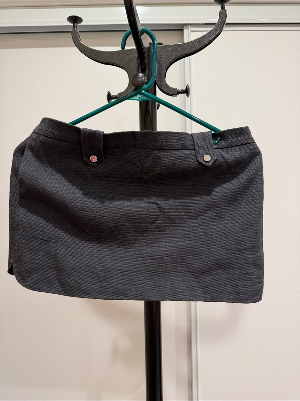 Black Mini Skirt with Front Pocket Details